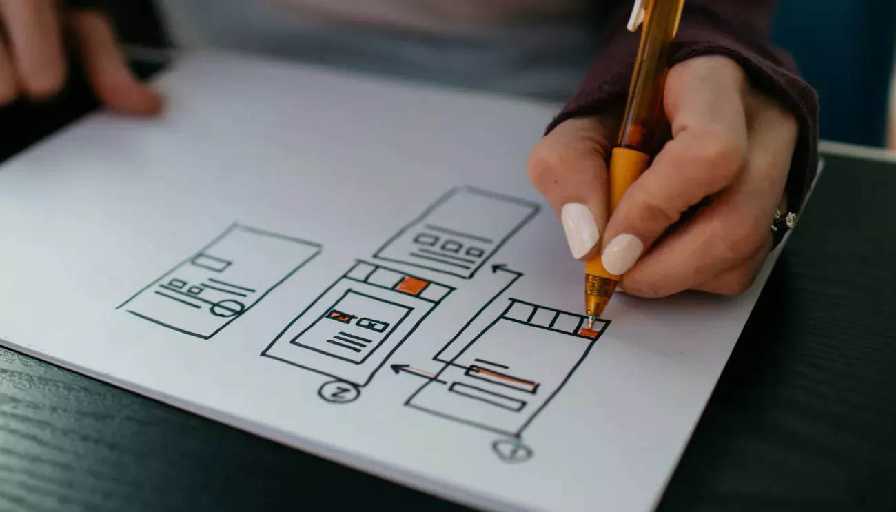 Person drawing a chart